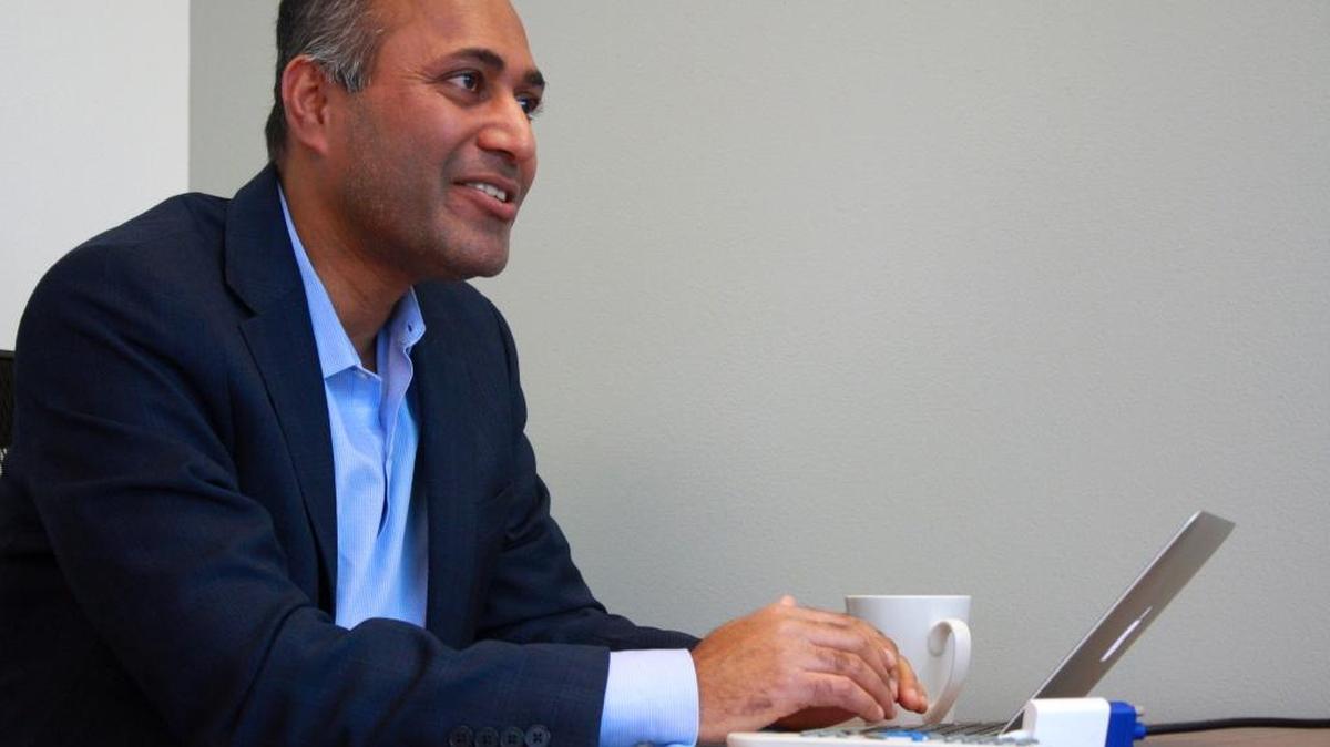 Dr. Binay Shah works in his Bellingham office in February.