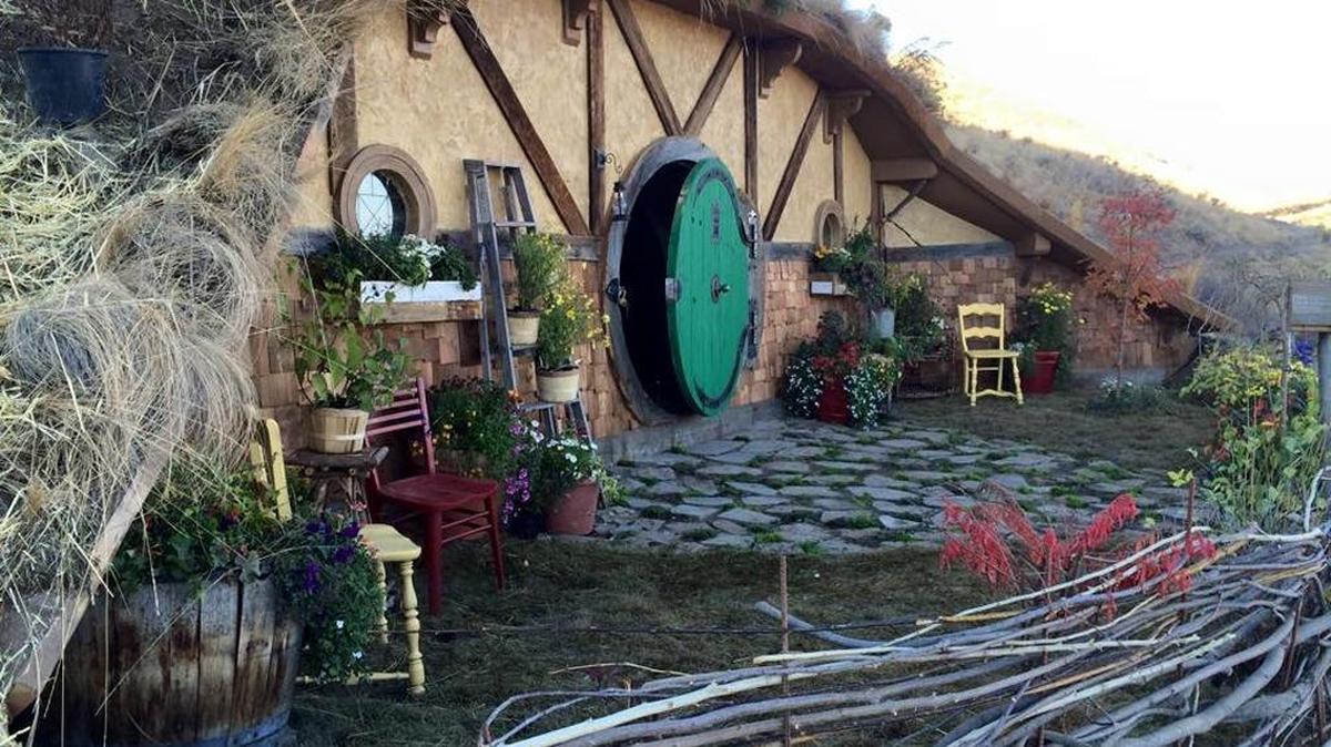 The front of the Hobbit Hole, cut into a hillside and covered. The one-bedrook tiny house near Chelan rents for $250 a night.