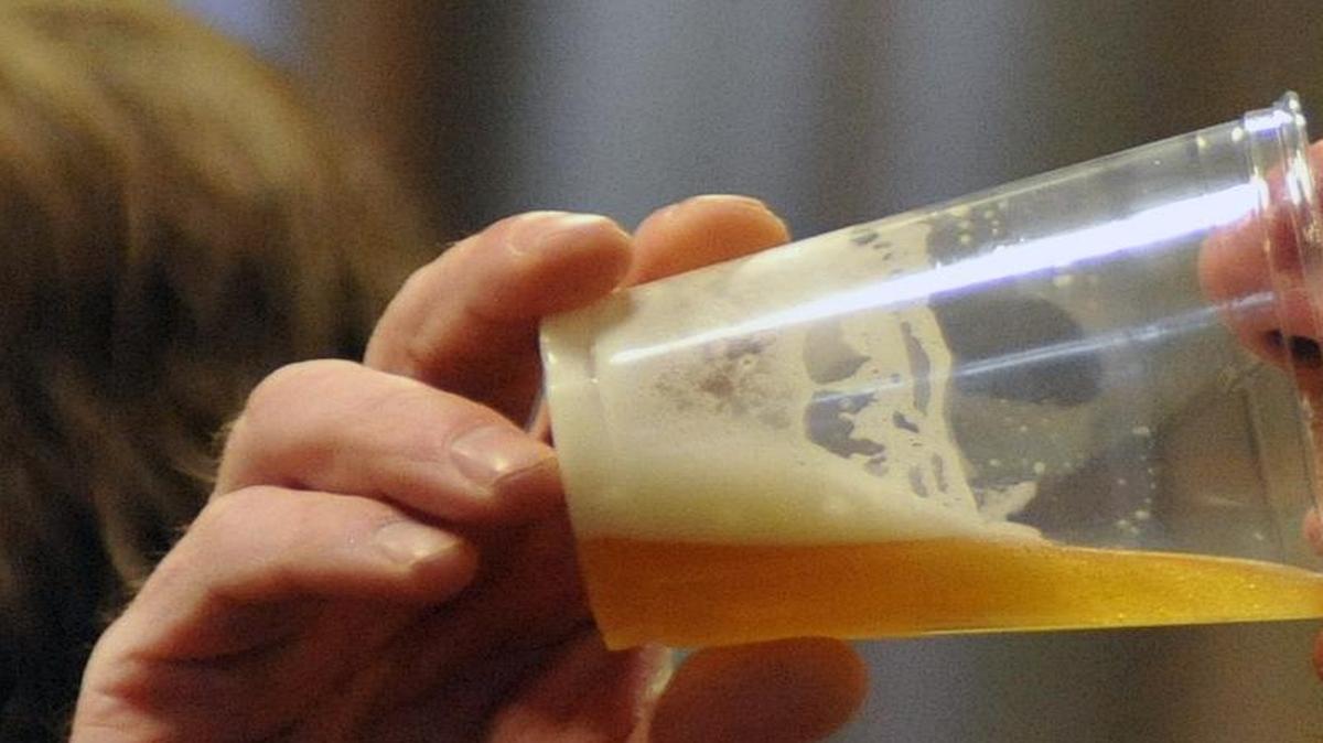 Bellingham Herald beer critic Caleb Hutton (not shown drinking) says at least four local brews are almost perfect, giving them all an “A-” grade.