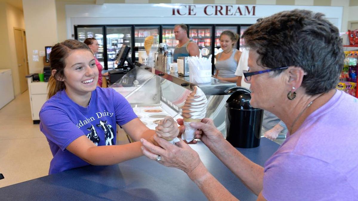 
Felicia Moorlag serves ice cream to Helen Densmore of Ferndale at the Edaleen Dairy store in downtown Blaine on July 9, 2015.
