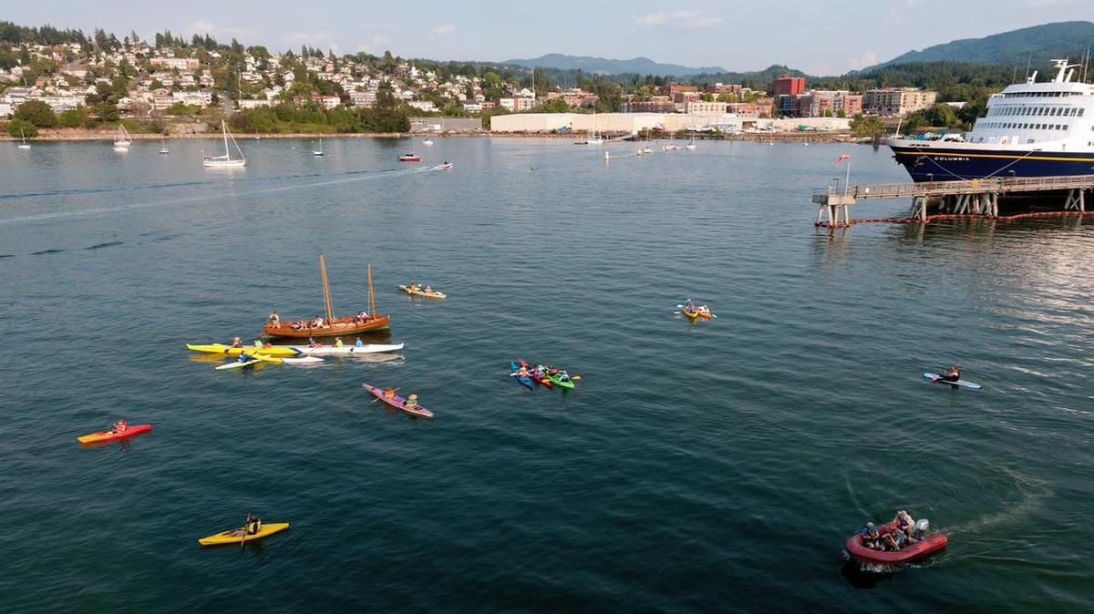 
The Community Boating Center in Fairhaven hosts “farewell flotillas” at which kayakers, paddle boarders and people in other watercraft say goodbye when an Alaska ferry departs Bellingham Ferry Terminal. The center was one of several local amenities cited in the May 2015 issue of Better Homes and Gardens, which described Bellingham as an up-and-coming “hot spot” community.
