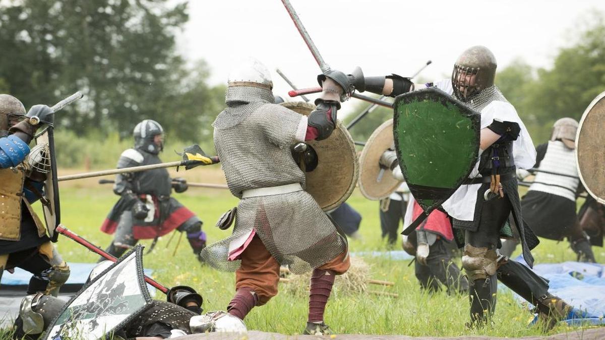 Whatcom County-based Thornwood, left, takes on fighters from Everett-based Aquaterra at Warren War, a medieval battle hosted by the Whatcom chapter of Society for Creative Anachronism. The event was held in August 2015 at Hovander Homestead Park, Ferndale.