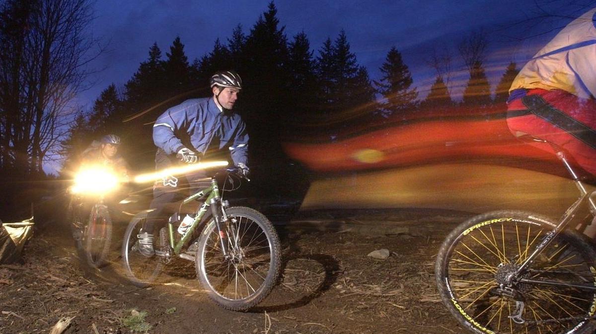 Accomplished mountain bikers with proper equipment can ride Galbraith Mountain and other trails at night.