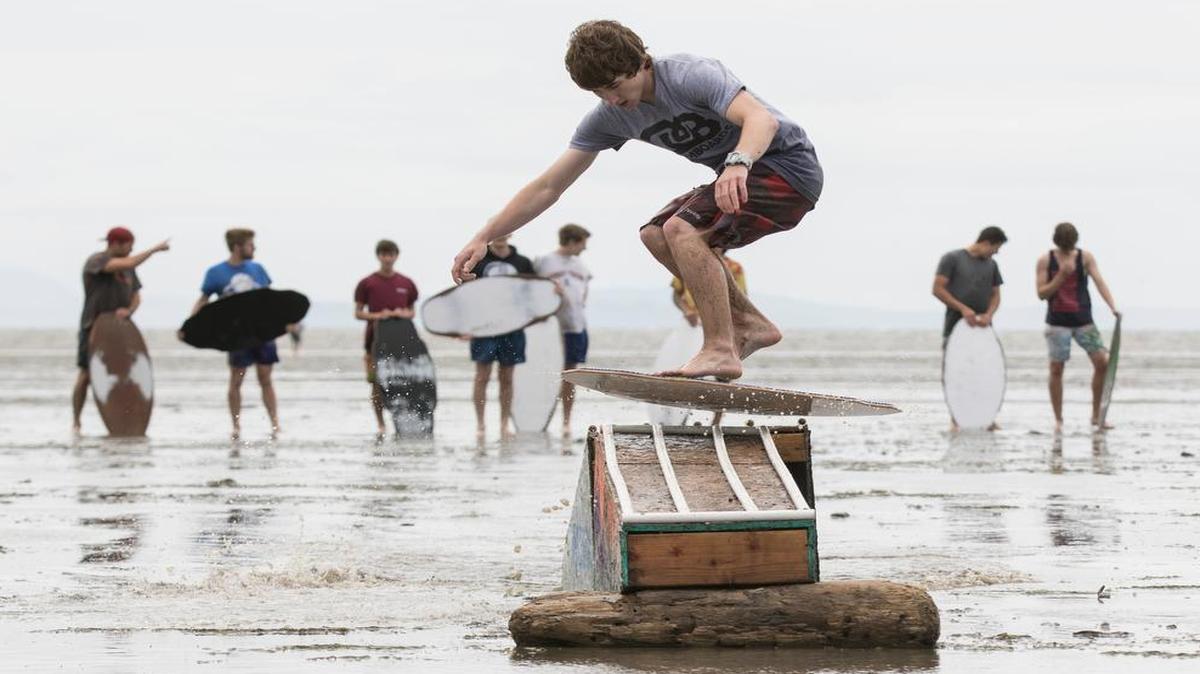 
Casey Gackle of Tacoma was one of more than 30 skimboarders who gathered for a skimboard jam on Bellingham Bay in May 2015. The event was organized by DB Skimboards, a Tacoma company. 
