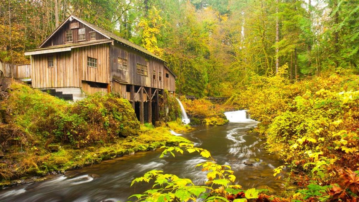 Built in 1876, Cedar Creek Grist Mill in Woodland, Wash., uses water power to grind grain with stones. A nearby covered bridge is also a popular attraction.