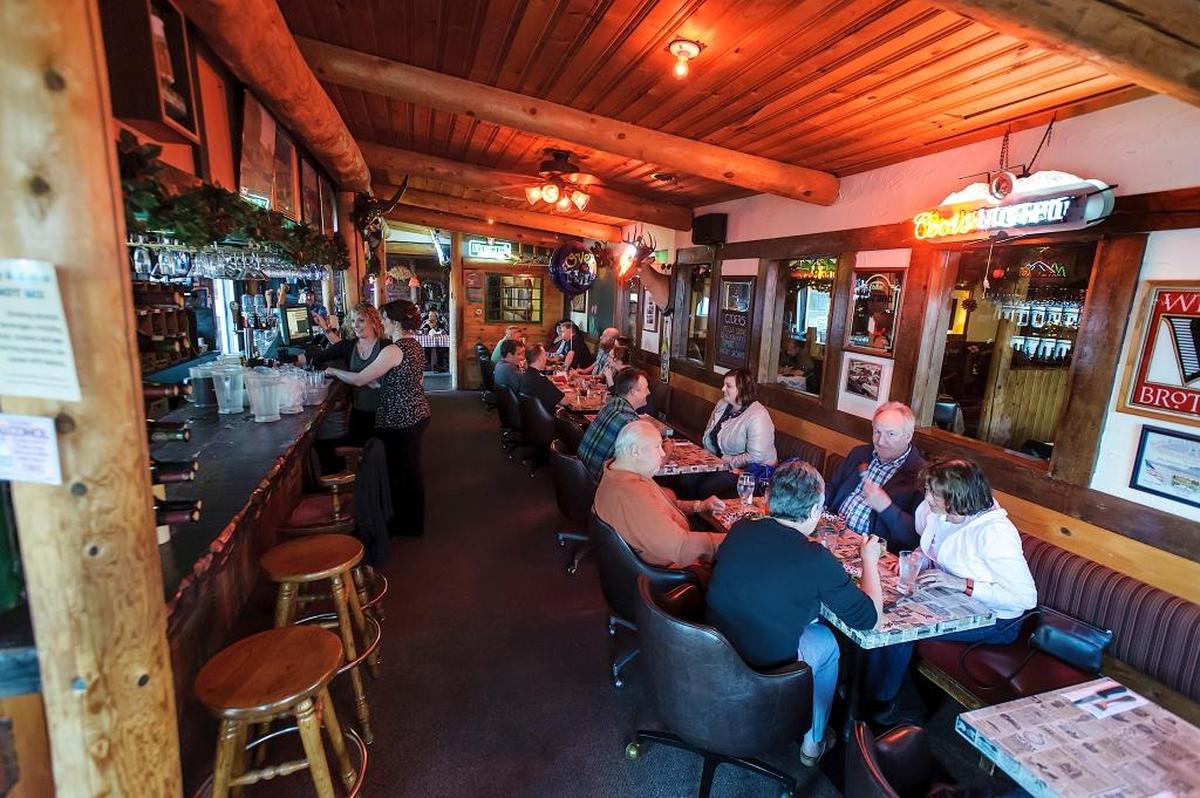 Diners enjoy the service at Herb Niemann’s Steak and Schnitzel House in Everson in 2016.