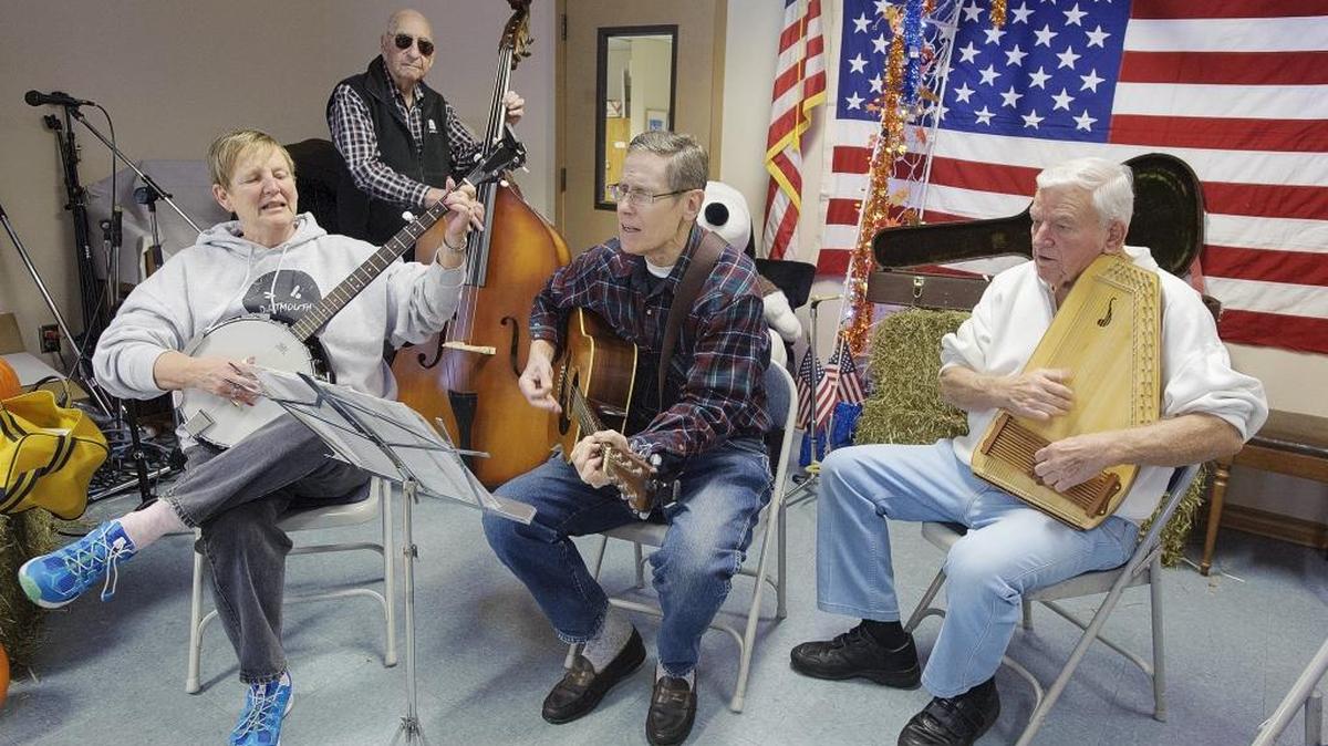Toni Blakely, left, Rodney Dement, Mick Blakely, and Ray Sipes play music for the guests during the monthly pancake breakfast in November 2015 at the Blaine Senior Center in Blaine, Wash.