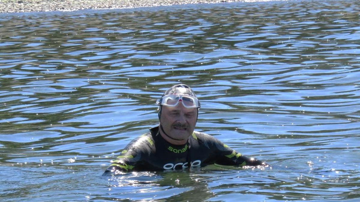 
Johannes Lisiecki rests Aug. 7, 2015, after swimming two miles from Birch Bay Village to Birch Bay State Park. Lisiecki, who has had open-heart surgery, is using his long-distance swims to promote greater awareness of congenital heart defects.

