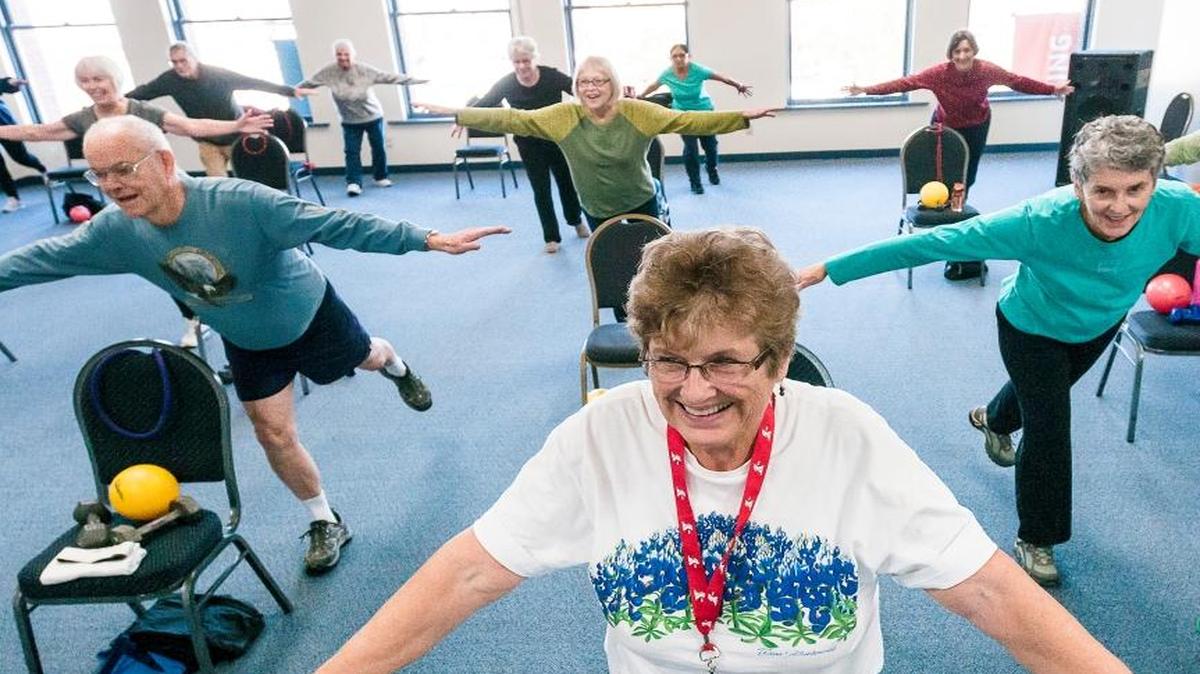 Mary Whitten of Bellingham, foreground, and other participants enjoy the exercise class SilverSneakers conducted by YMCA fitness instructor Lesley Jones-Steinmetz on Nov. 20, 2015, at Whatcom Family YMCA in Bellingham. Jone-Steinmetz says the class helps seniors with their physical fitness, balance, and injury prevention.