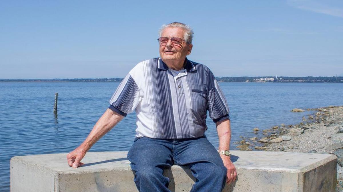 
Retired physician Warren Bergholz enjoys a sunny day at Marine Park in Fairhaven in August 2015. He says the park should be renamed to honor Alonzo Poe, an active pioneer who once owned the land.
