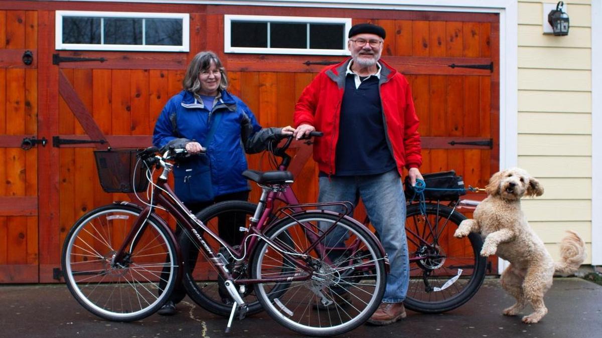Shown in February 2016, retirees Jane and Terry Brooks, and their dog, Duffy, enjoy life without a car in Bellingham. With smart planning, they get where they need to go by walking, bicycling, riding buses, and, on rare occasions, renting a car.