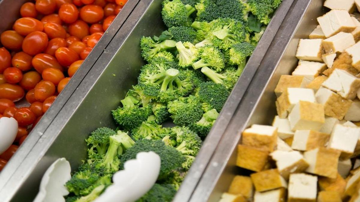 Salad bar options can include organic grape tomatoes, organic broccoli and organic tofu, but also toppings that are heavy in fat and salt, so build your salad carefully.