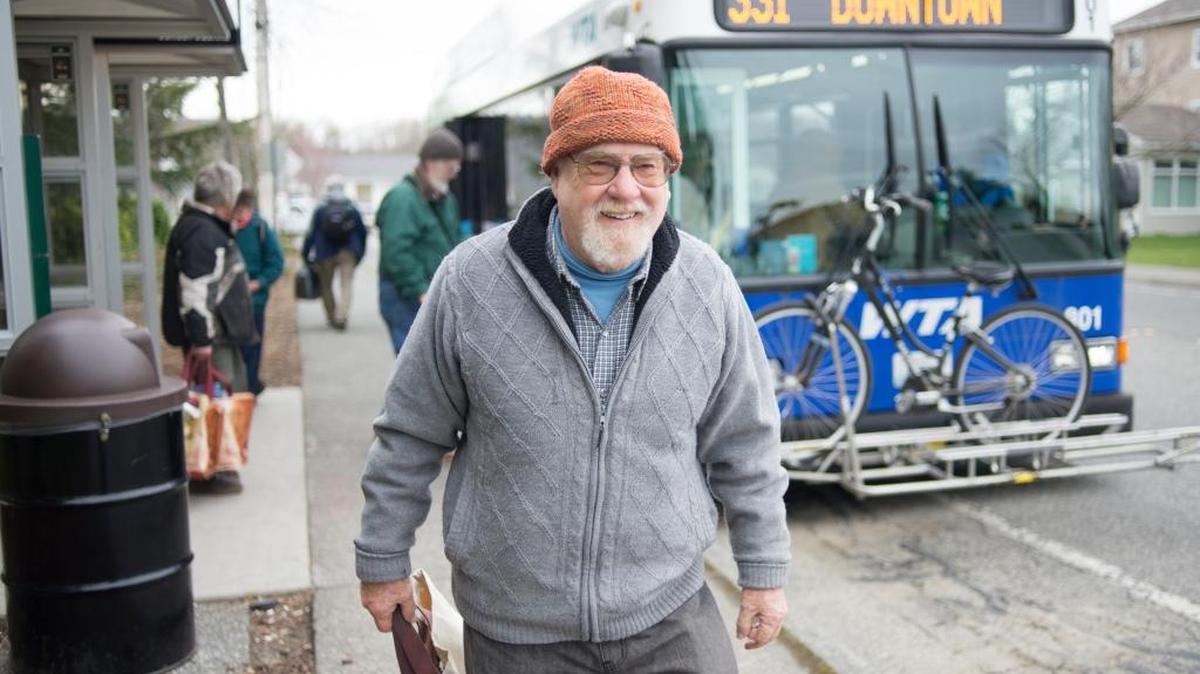 Bob Hendricks walks away from the bus stop at Sunset Square in Bellingham. He says he is a huge fan of the Whatcom Transportation Authority’s bus fleet.