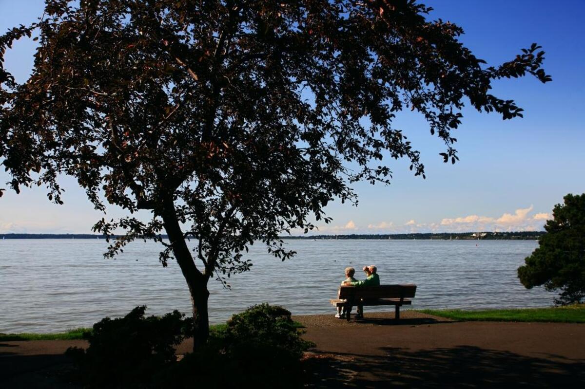 Marian and Donal Haaland sit near the bay at Boulevard Park in August 2008.