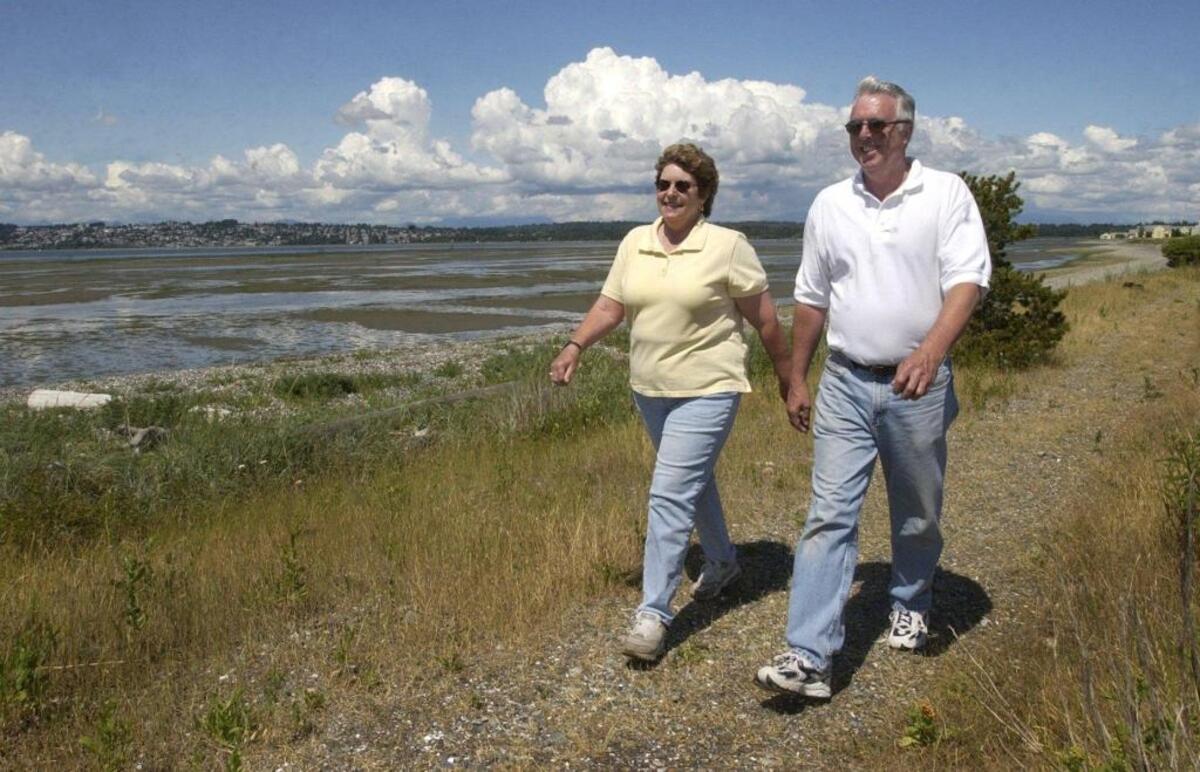 Lin and Bill Somersall of Blaine enjoy a walk at Semiahmoo in July 2003.