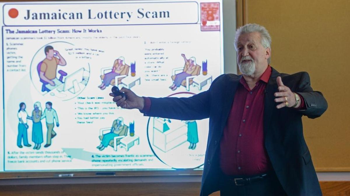 George Edward, author of “How to Steal from Mom, A Wake up Call for Seniors,” discusses financial safety at the Bellingham Senior Center May 10. In most financial fraud and abuse cases he’s investigated, the victim was alone, physically disabled, confused or suffering from Alzheimer’s.