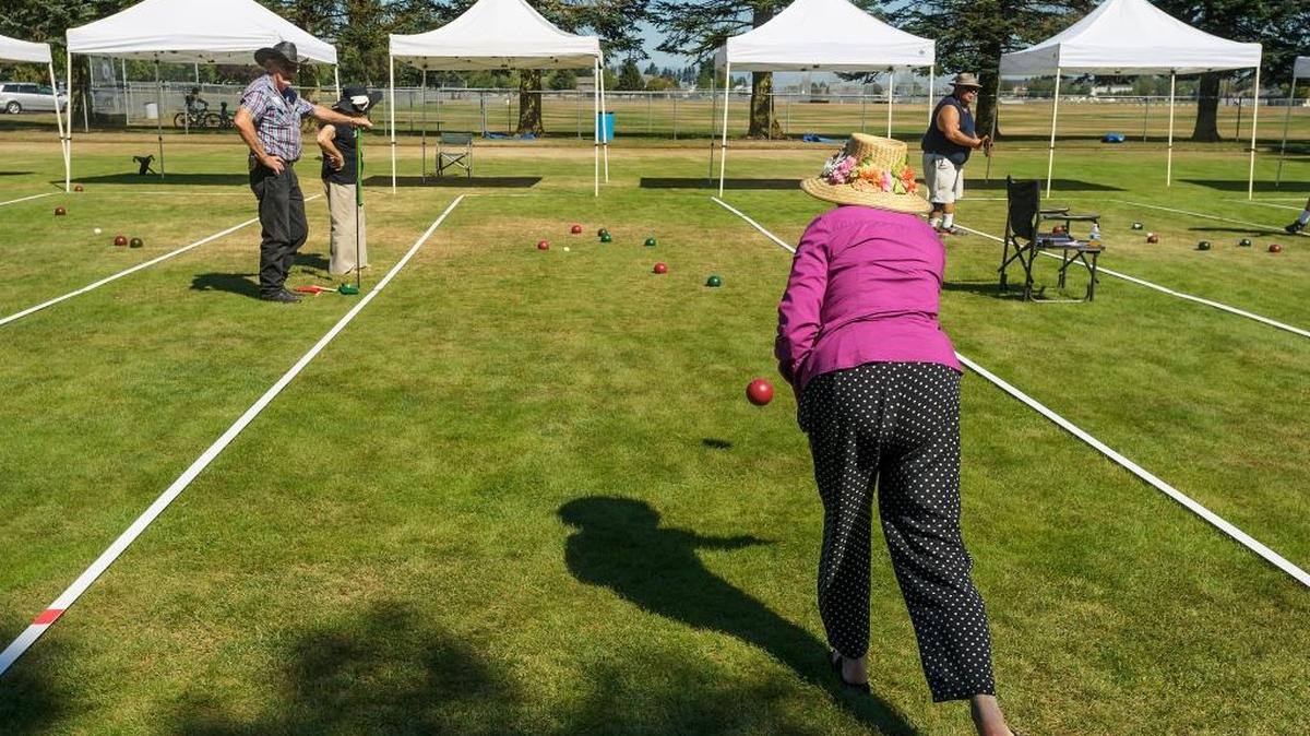 Pat Hanowell, 85, of Ferndale takes her turn during the third round of the 2017 All County Bocce Tournament at Bender Fields on Monday morning August 28, 2017, in Lynden, Wash. Lynden senior center director Cathi Le Cocq (cq) said 10 teams from the Lynden, Blaine, Bellingham, and Ferndale senior centers participated in the tournament. She said the seniors played to win “trophy and bragging rights” with the winner’s being named on the trophy.