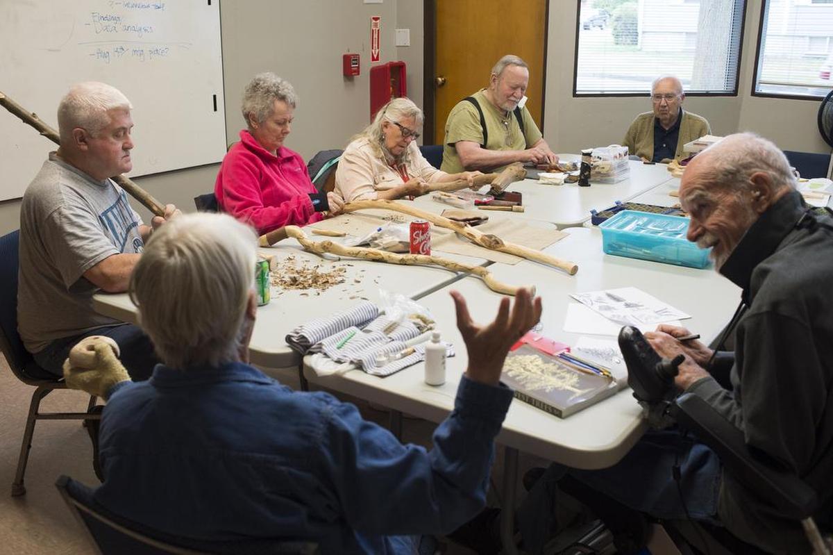 Woodcarvers chat during a work session at the Bellingham Senior Activity Center.