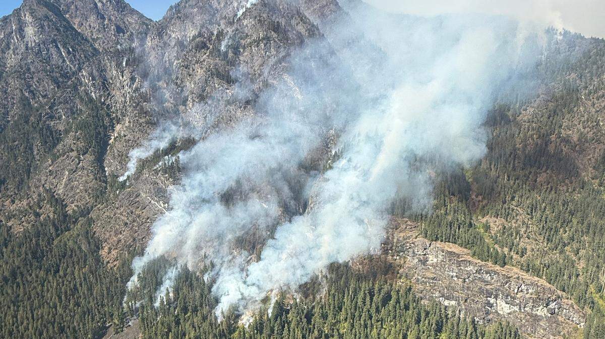 An undated photo shows one of three wildfires burning in eastern Whatcom County