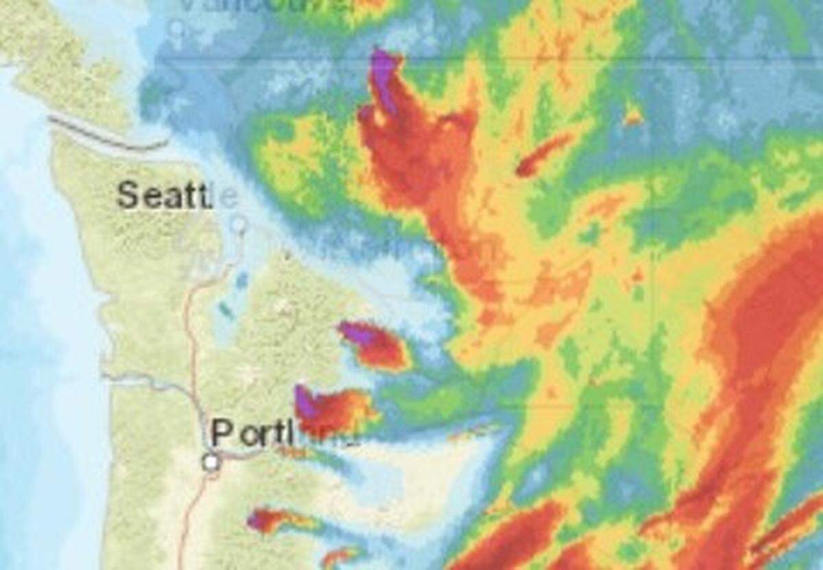 A computer map from the National Oceanic and Atmospheric Administration shows wildfire smoke drifting across Western Washington on Wednesday.