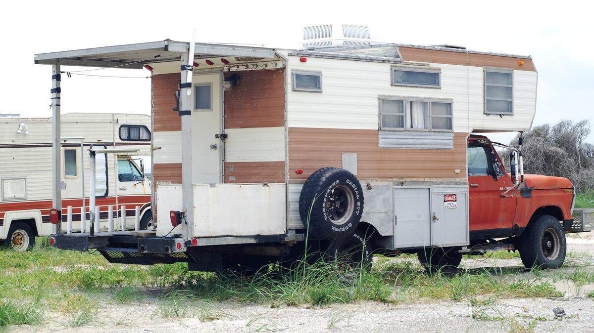 A recreational vehicle in North Carolina, customized for beach driving and offshore fishing.