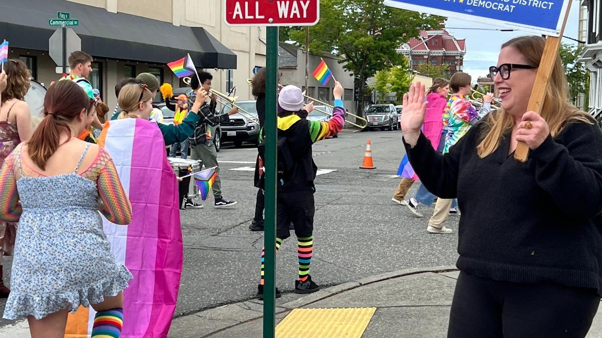 State Rep. Alicia Rule, D-Blaine, cheers participants in the Whatcom Youth Pride parade in downtown Bellingham, Wash., on June 1, 2024.