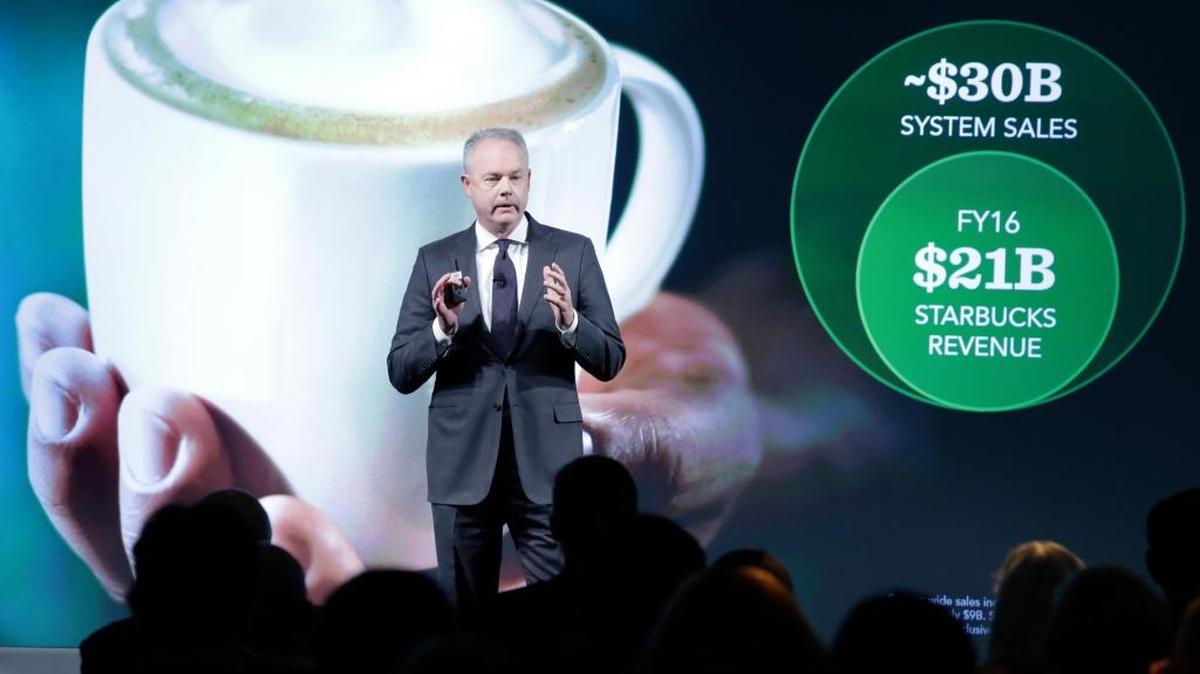 Starbucks President and COO Kevin Johnson presents during the Starbucks 2016 Investor Day meeting, in New York, Wednesday, Dec. 7, 2016.