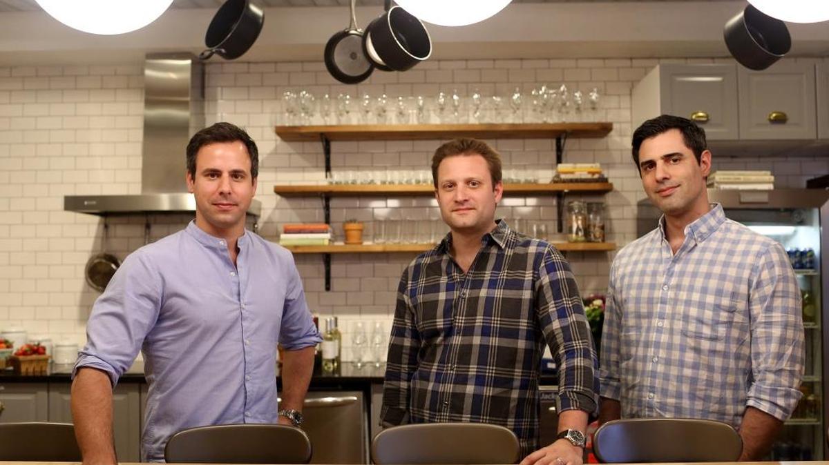 From left: Co-founders Matt Wadiak, Matt Salzberg and Ilia Papas, seen in their company’s Manhattan, N.Y., office, have grown Blue Apron rapidly since it was founded in 2012. After a humble start testing recipes in Wadiak’s apartment and packing the boxes themselves, the company now delivers 8 million meals per month.