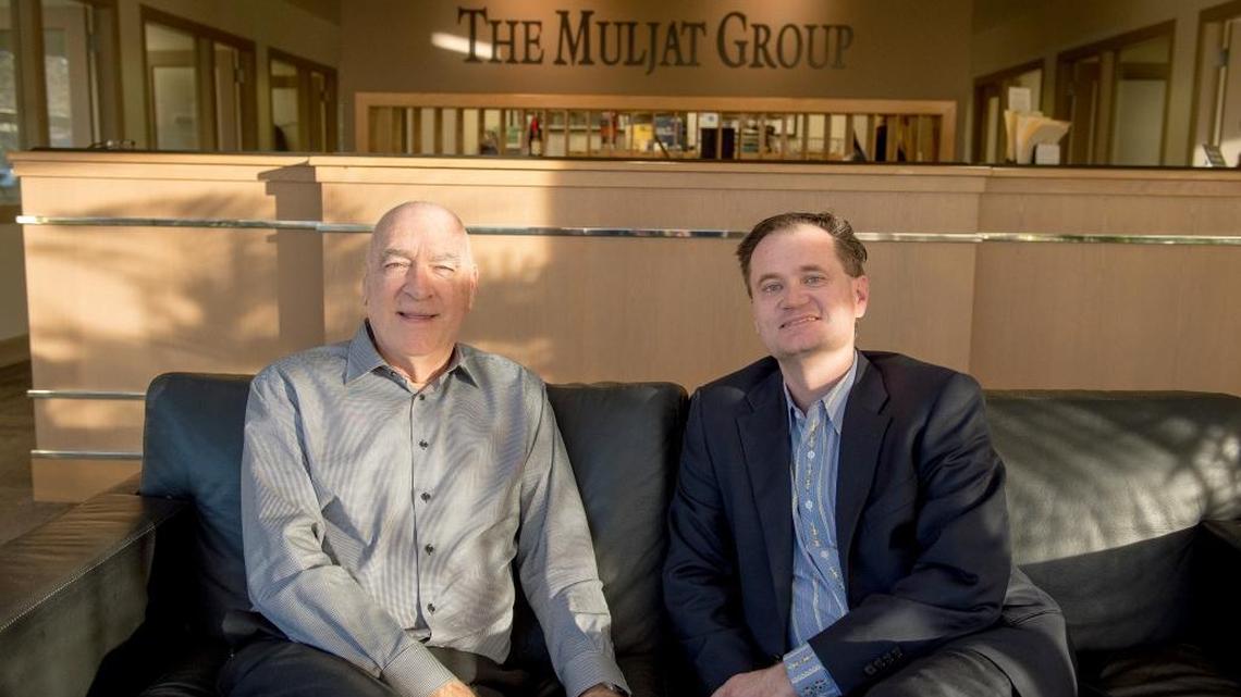 Frank Muljat, left, and his son Troy Muljat, are pictured at The Muljat Group office in Bellingham on Tuesday, Jan. 10, 2017.
