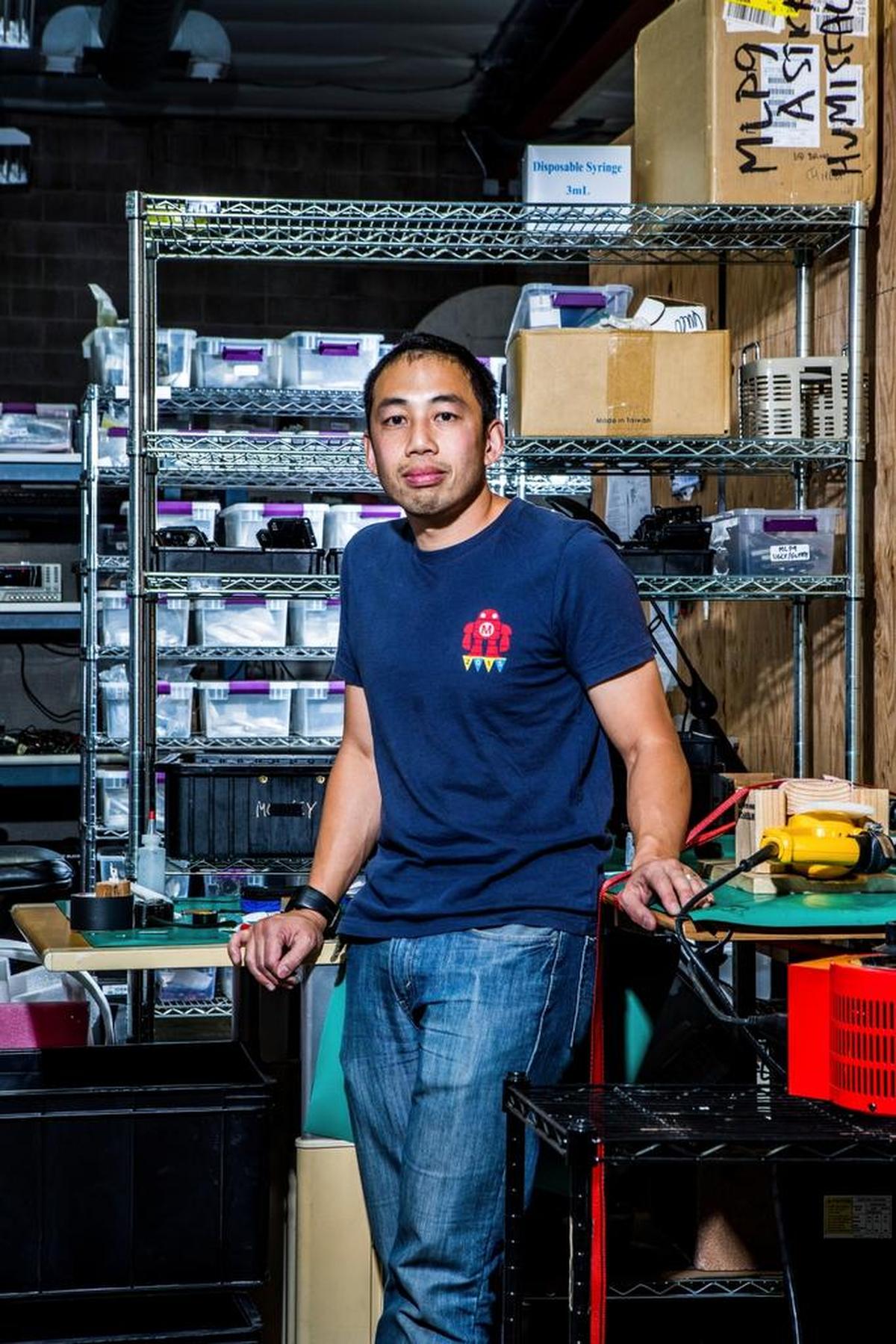 Phyllip Ye, top engineer at Monkeylectric, which has been in business for 10 years, convincing night cyclists that front and back lights are inadequate and that they need bright side lighting, too, at company headquarters in Berkeley, Calif.