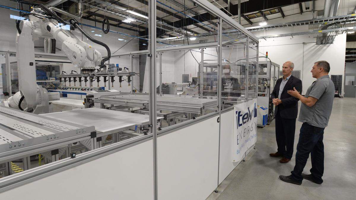 U.S. Representative Rick Larsen tours Itek  Energy’s new solar panel manufacturing facility on Cornwall Avenue with Chief Operating Officer Dave McCarty in Bellingham Friday, Oct. 6, 2017. The new facility, at 48,000 square feet, is three times larger than its previous facility. On Aug. 30, the Canadian firm Silfab announced it was putting a major investment into the facility and will expand its operations.