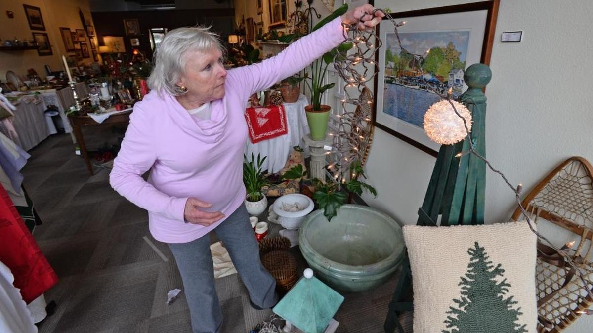 Barbara Cronin, owner of The Oyster, Home & Garden Decor, sets up holiday decorations in her Fairhaven store in Bellingham, Thursday, Nov. 16, 2017. “I like unusual things,” said Cronin about her store.