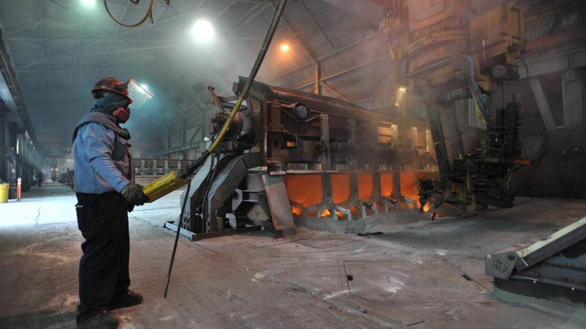 Worker Kevin Daniels works on an aluminum smelter pot on potline B at the Alcoa Intalco aluminum smelter west of Ferndale, Feb. 15, 2011. Alcoa and the Bonneville Power Administration on May 2, 2016 announced a power agreement that will keep the smelter operating until at least Feb. 24, 2018.