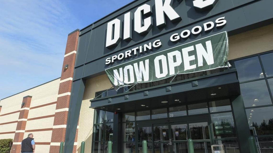Seth Jeretzky waits outside the Dick's Sporting Goods store to open for the first time at Bellis Fair Wednesday, May 10, 2017. It was one of the bigger national retailers that opened in Bellingham so far in 2017.
