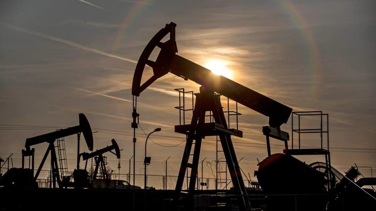 The sun sets beyond oil pumping units, also known as nodding donkeys or pump jacks, at an oil plant operated by MND AS in Uhrice, Czech Republic. Tumbling crude and natural gas prices have weakened the energy industry’s influence in Washington, D.C., as cutbacks in the oilfield have spread to the nation’s capital.