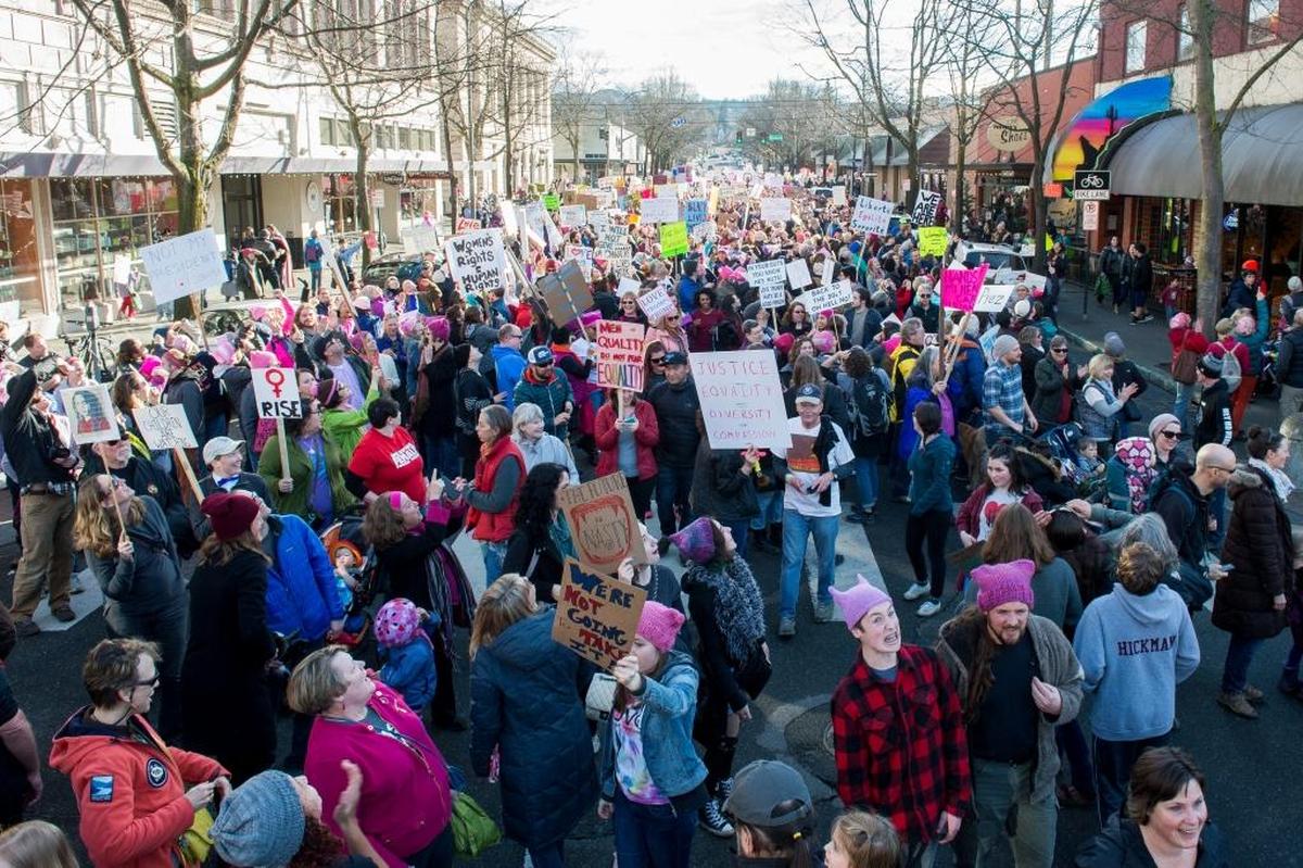 Protesters march down Magnolia Street during the Women's March on Bellingham on Jan. 21, 2017.