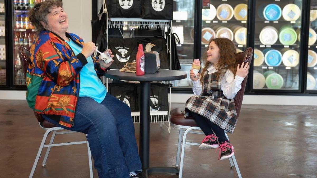 Marsha Bradshaw, left, and her granddaughter Katie Bradshaw, 6, laugh while eating ice cream at the new Edaleen Dairy store on Second Avenue and Portal Way in Ferndale on Tuesday, March 8, 2016. The Ferndale store is the fifth Edaleen shop in Whatcom County.