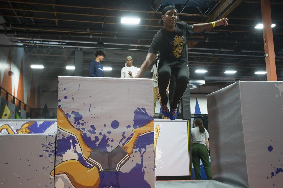 Demond Allen, 15, jumps between trampolines at Summit Trampoline Park in Bellingham.