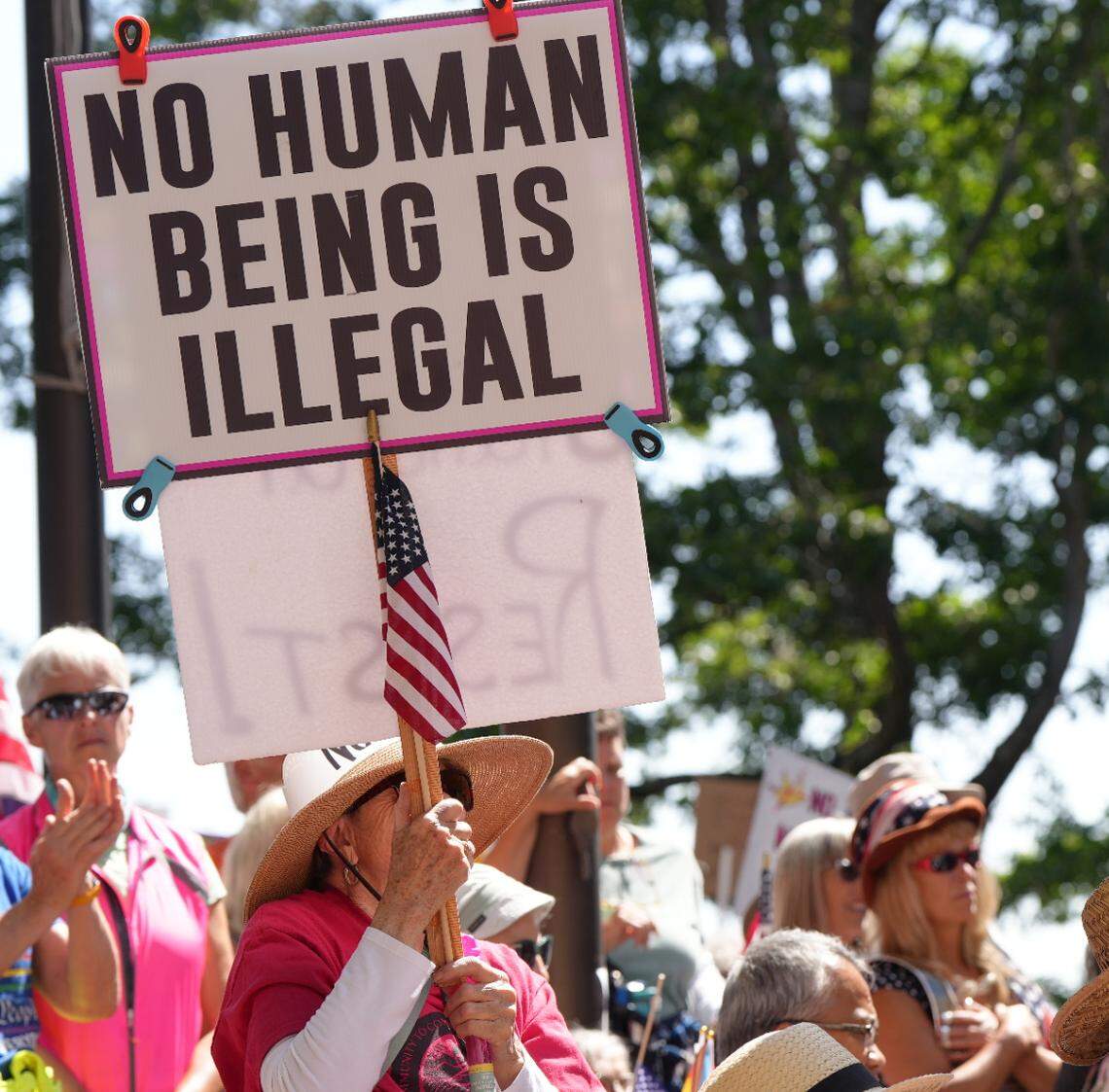 The crowd filled City Hall grounds, all of Lottie Street, and the adjacent library lawn.