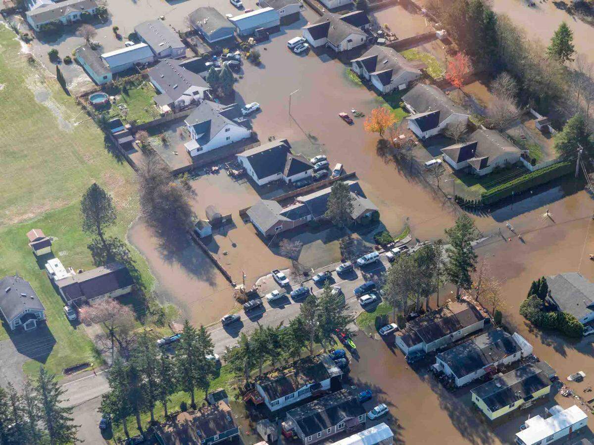 Whatcom County images show damage from the three days of record rainfall Saturday-Monday, Nov. 13-15. The areas of Sumas and Everson and near the city of Ferndale were inundated with floodwaters from the Nooksack and other rivers.