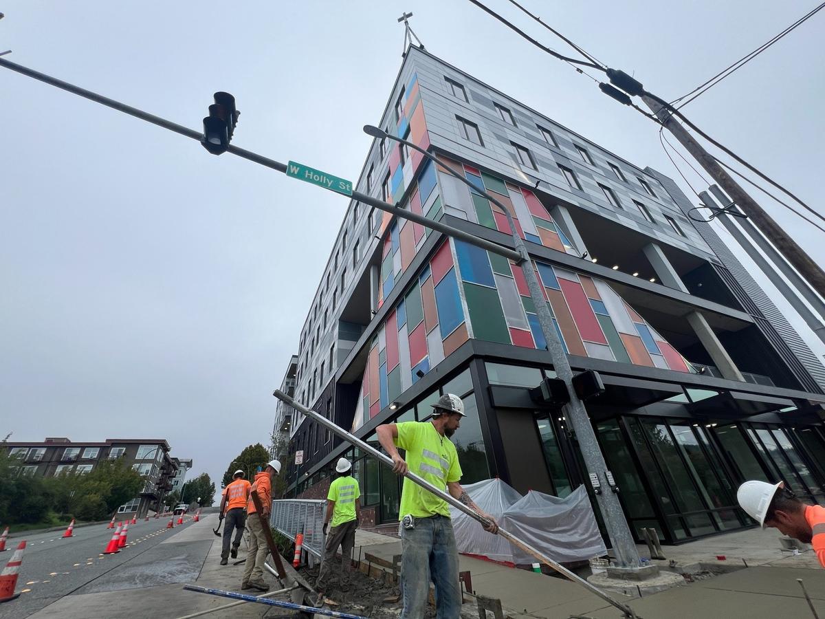 Workers put the finishing touches on the new Lighthouse Mission in the Old Town neighborhood of Bellingham on Sept. 18.