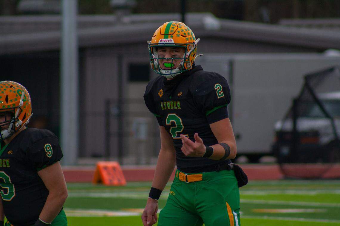 Lynden quarterback Brant Heppner motions to a receiver on Saturday in Ferndale. It was Heppner’s final game playing football for the Lions.