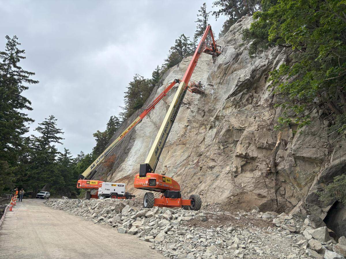 Chuckanut Drive was closed for weeks following a rock slide. WSDOT crews drilled anchors into the cliffside to increase stability as part of the cleanup effort.