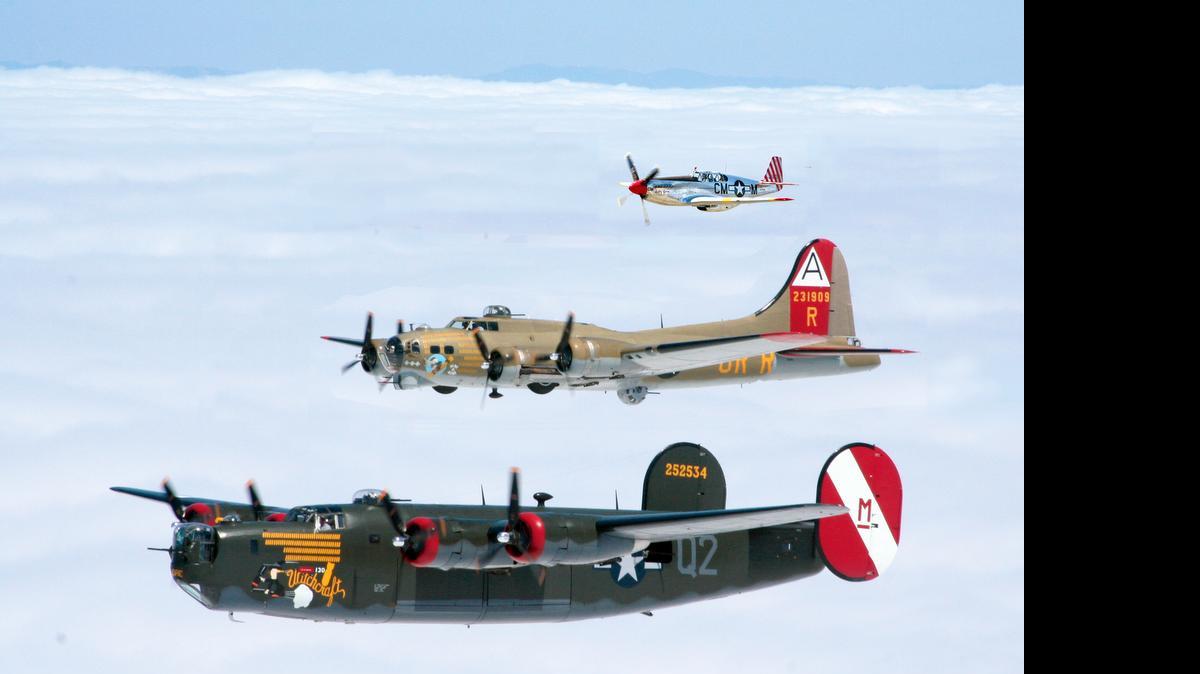 
A B-24 Liberator, B-17 Flying Fortress and P-51 Mustang in formation as part of the Collings Foundation's Wings of Freedom tour, coming to Bellingham International Airport on June 22-24, 2015.
