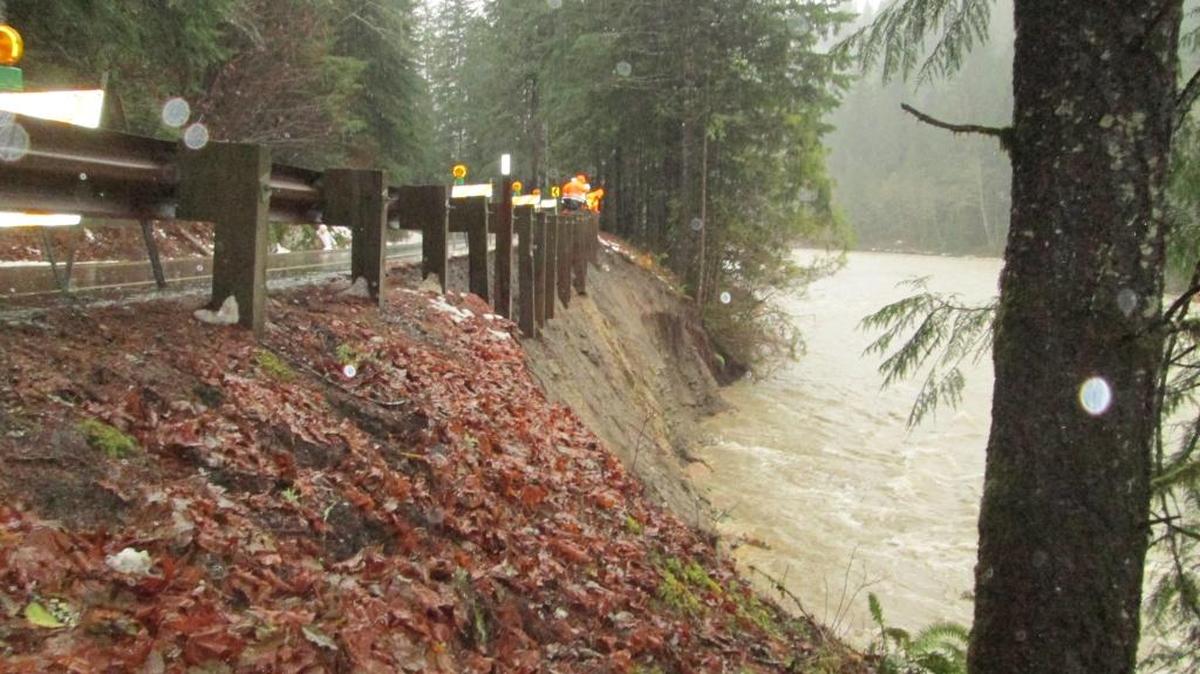 The Nooksack River, swollen by rain, eroded the bank below part of Mount Baker Highway and exposed 90 feet of guardrail posts along the eastbound lane Tuesday, Nov. 17. The state Department of Transportation has reduced the highway to one lane about six miles east of Glacier.