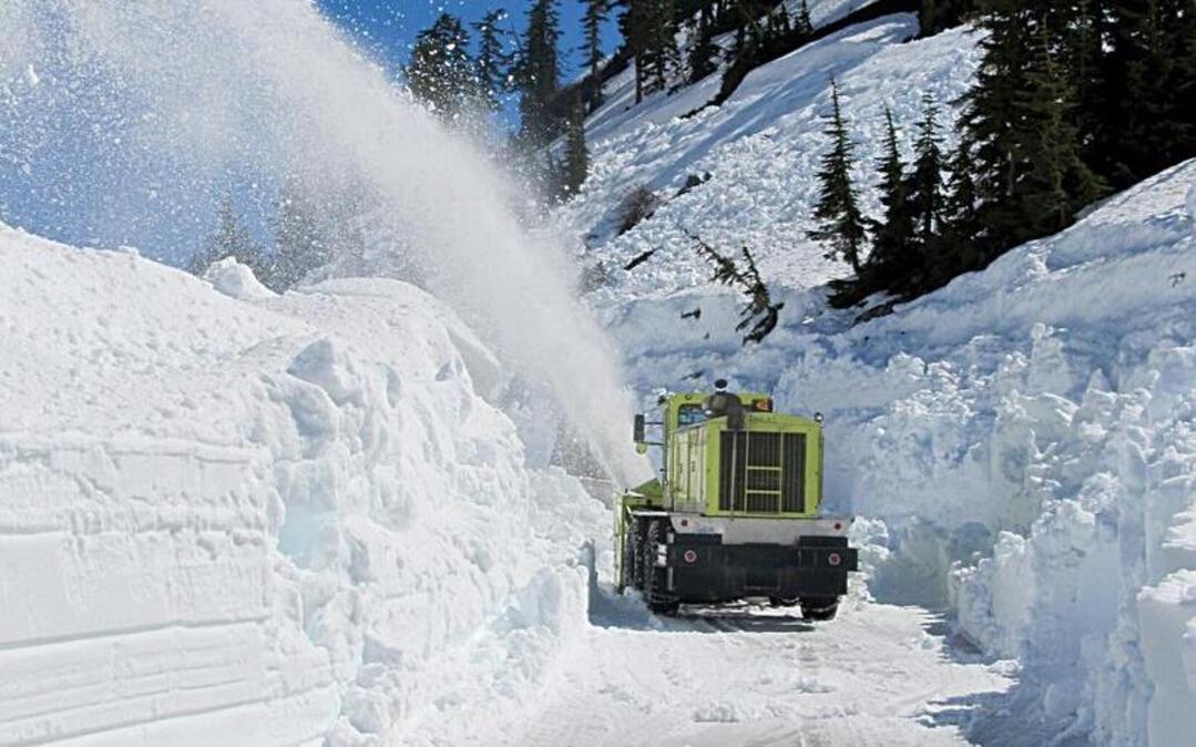 Washington State Department of Transportation crews clear snow from the road to Artist Point June 19, 2012.