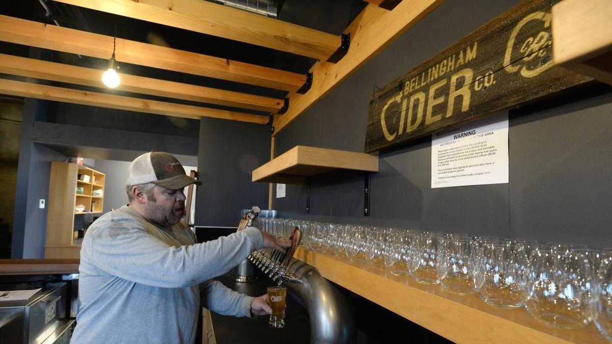 Co-owner Joshua Serface, pours a cider Thursday, Jan. 18, 2018, at the new Bellingham Cider Co., which is scheduled to open in Bellingham in February.