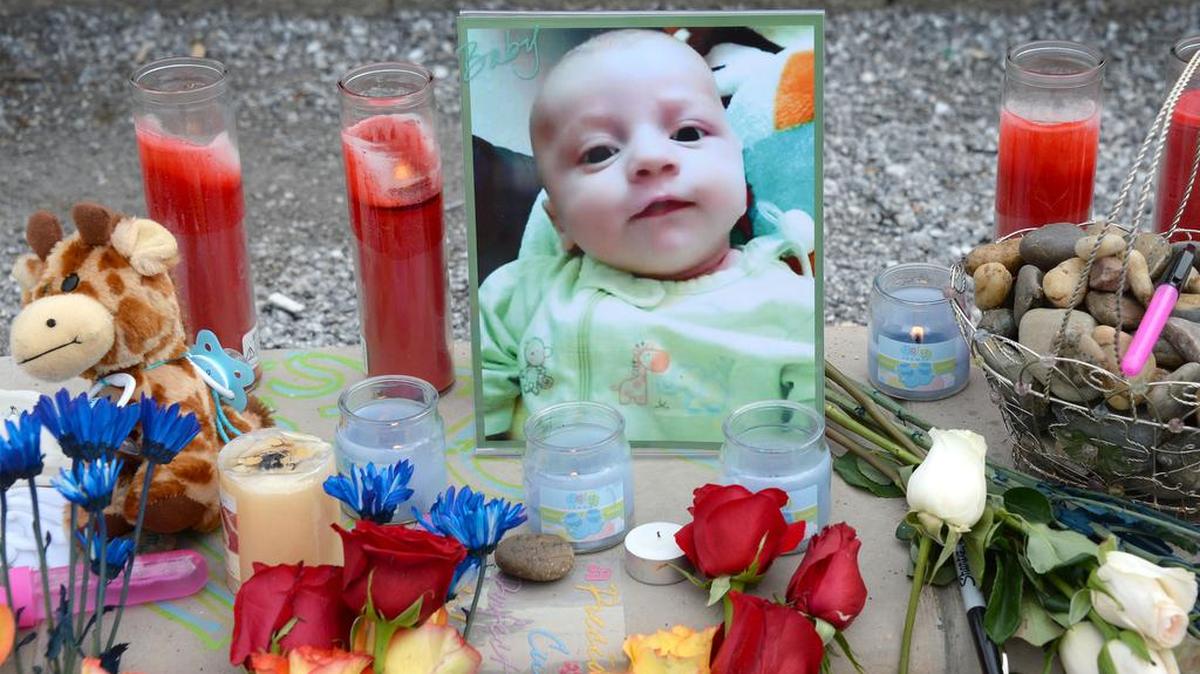 A memorial in Maritime Heritage Park in Bellingham, Wednesday, Feb. 24, 2016, for for Lucian Mykael Shields, who died in December at age 3 months. Lucian's parents are charged with manslaughter for his death.