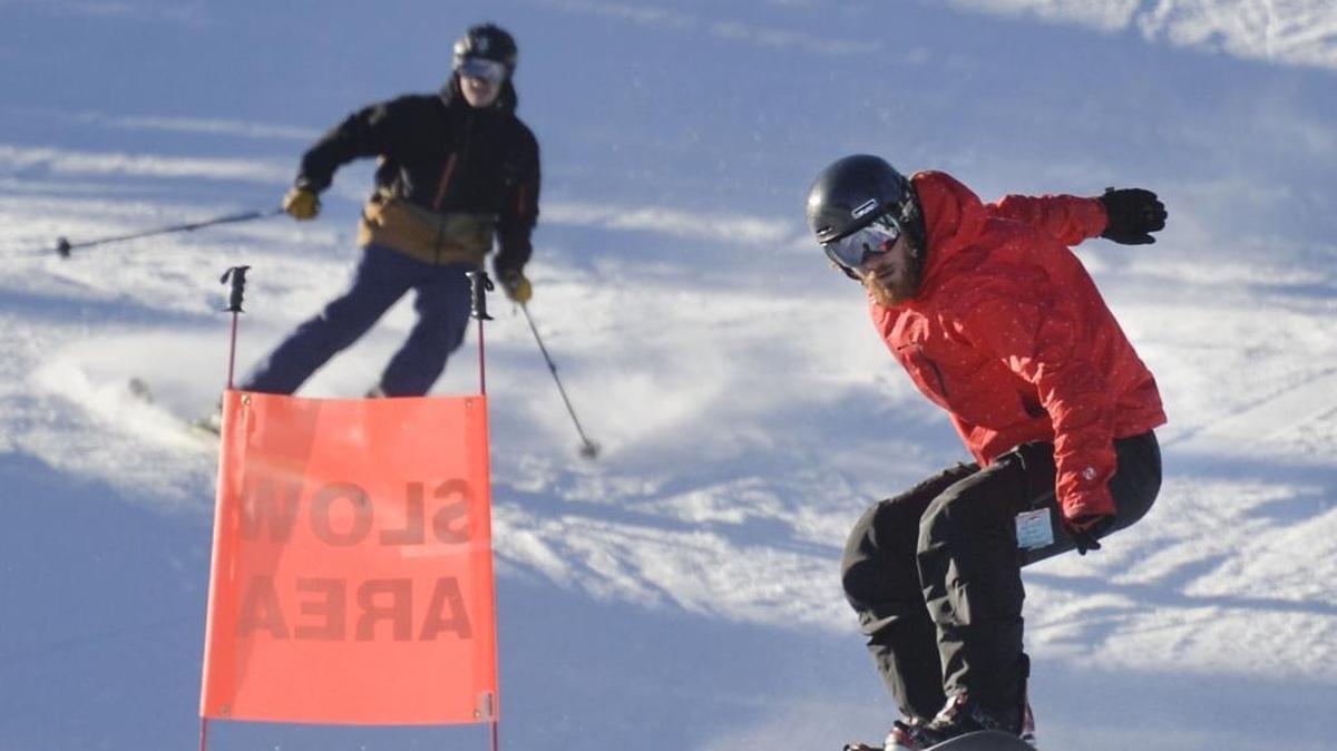A snowboarder gets a little air during the opening day at Mt. Baker Ski Area on Thursday, Nov. 19, 2015. A winter storm is expected to dump nearly three feet of snow in the North Cascades this weekend.