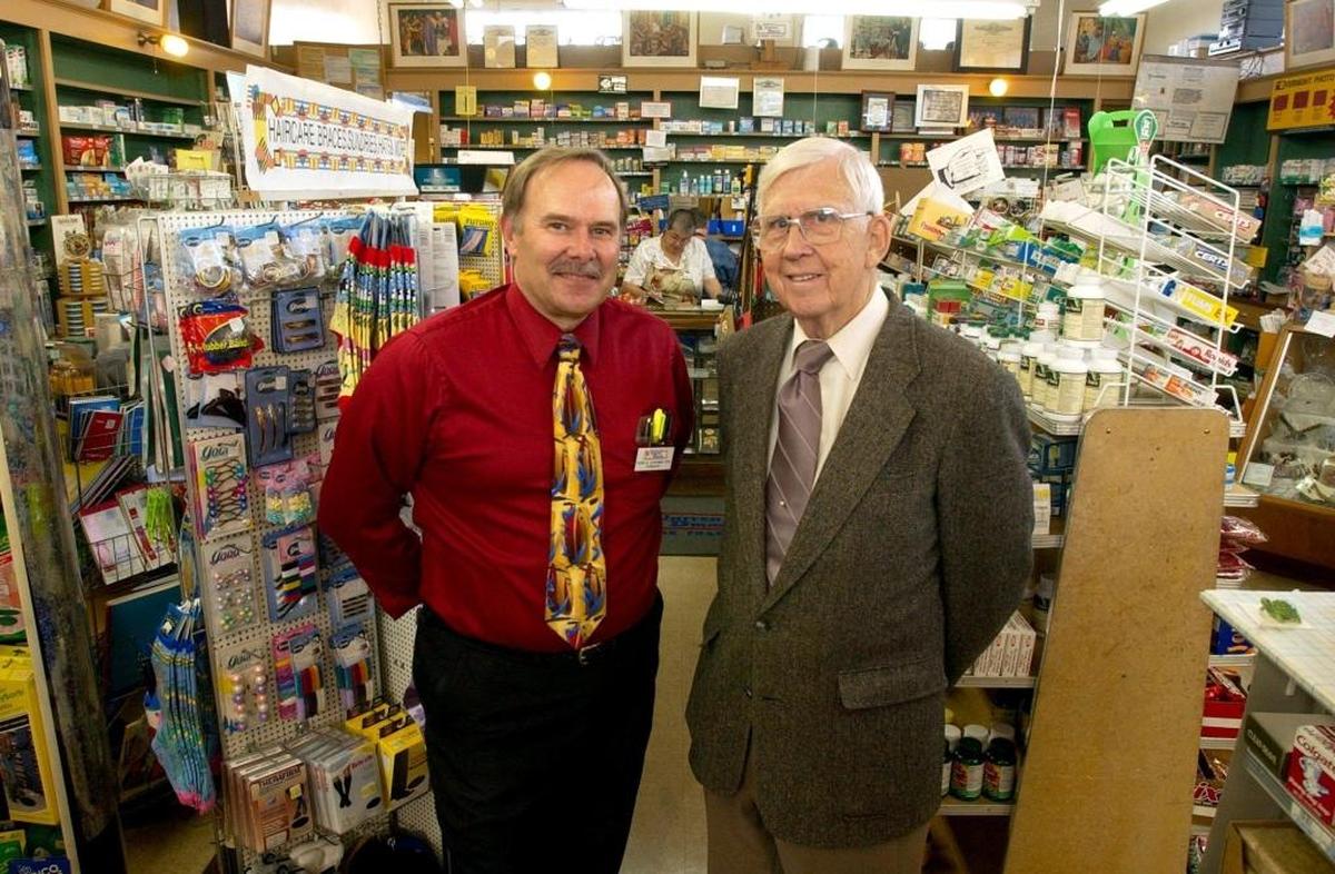 Robin Johansen, left, and Gordon Tweit in 2003. Johansen bought Fairhaven Pharmacy from Tweit in 1991.